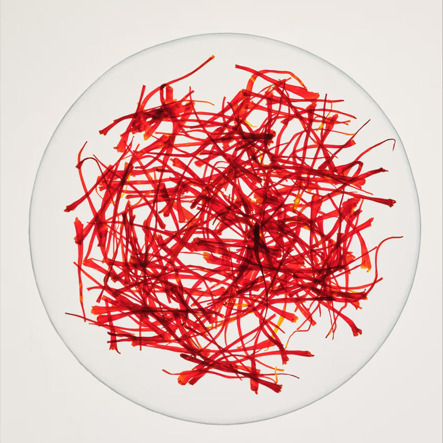 Saffron threads in a round glass dish